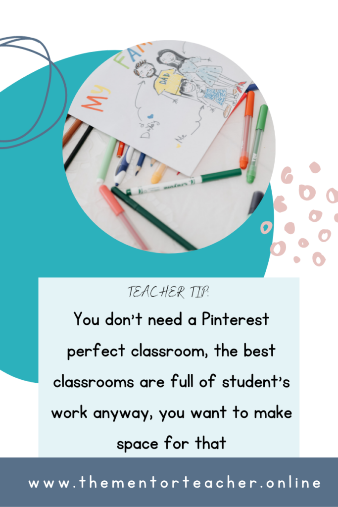 picture of a quote from  the blog post saying you don't need a pinterest perfect classroom, you should make room to display student work, with a picture of a child's drawing of their family. 